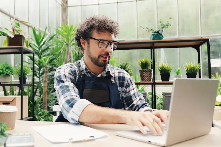 Person typing on a laptop