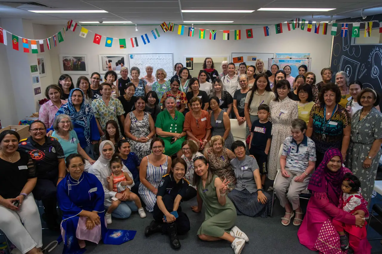 Communify community centre with team and community members gathered for photo